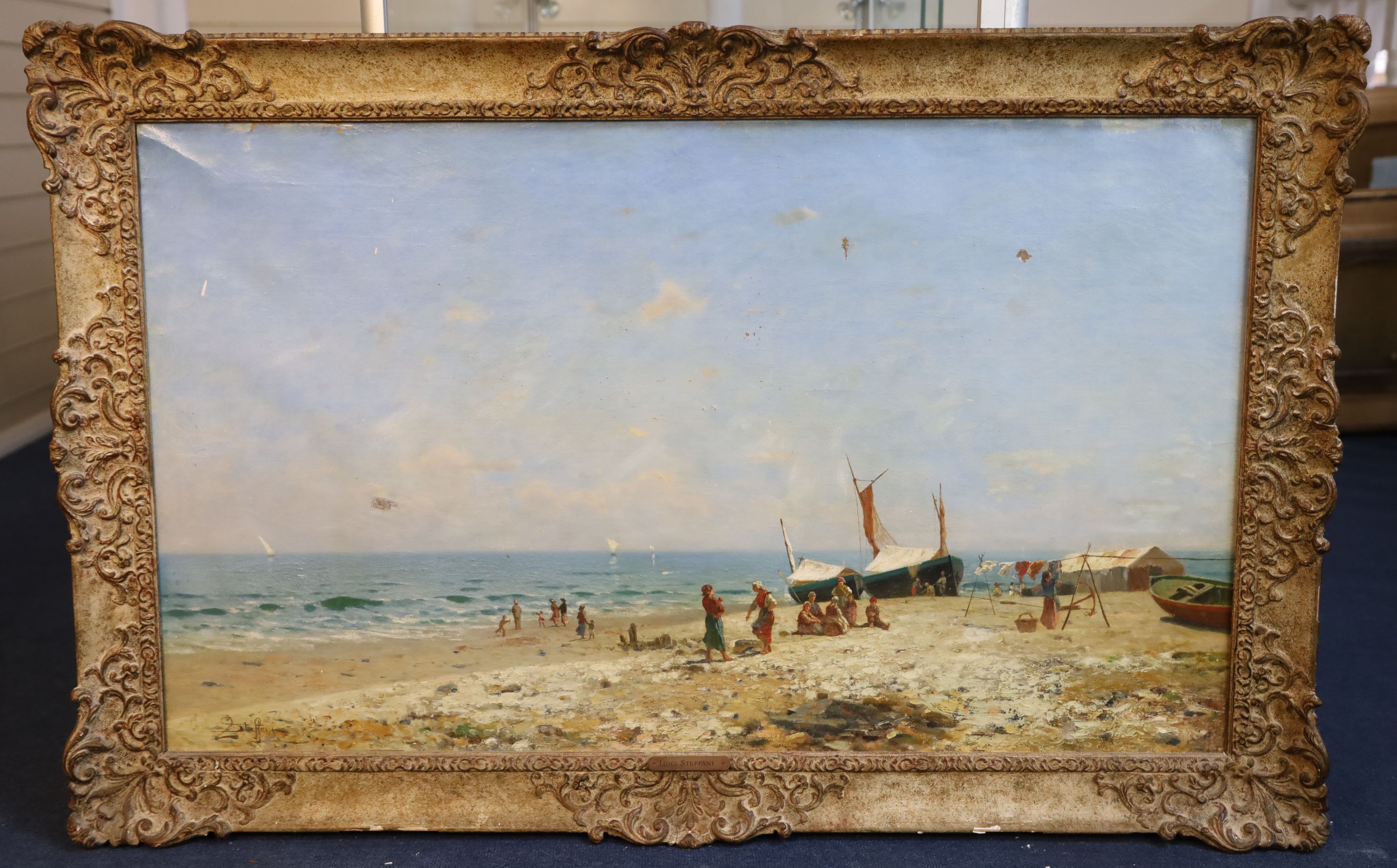 Luigi Steffani (Italian, 1827-1898) Fisherwoman and children on the beach 23 x 39in.